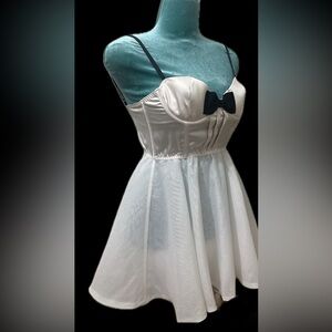 Elegant Cream Chemise with Black Bow